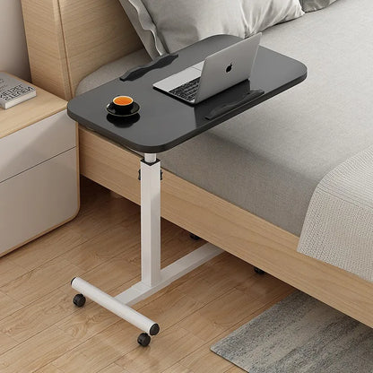 The Laptop Desk Rotates and Moves The Small Bedside Table